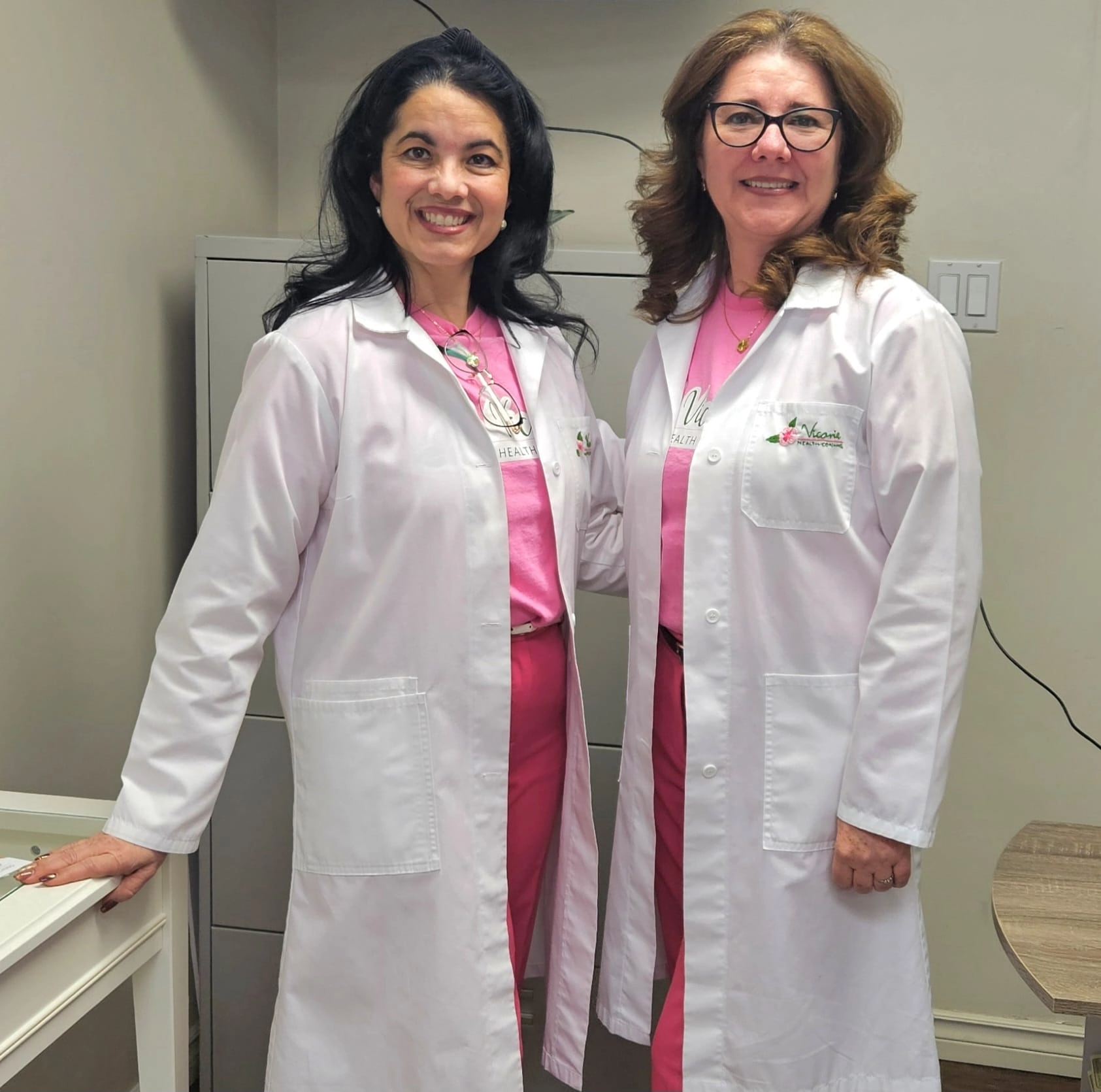 Fresh vegetables and fruit on a wooden counter in Hamilton, with a canvas grocery bag in the background
